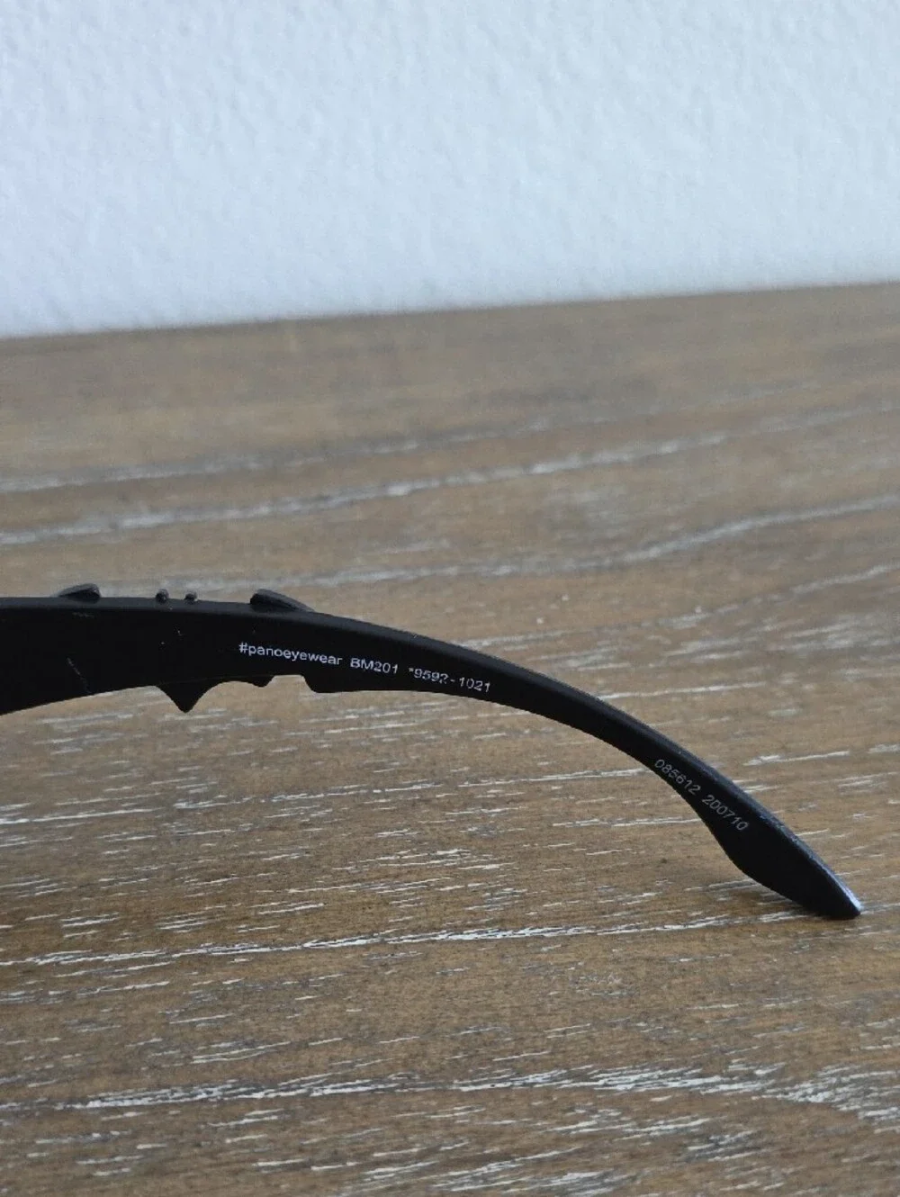 Black Sunglasses with Blue Bat Accent